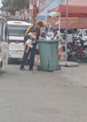 中国河南省にて子供を抱えながらゴミ箱を漁っている女性現る。もちろん当局によって動画削除