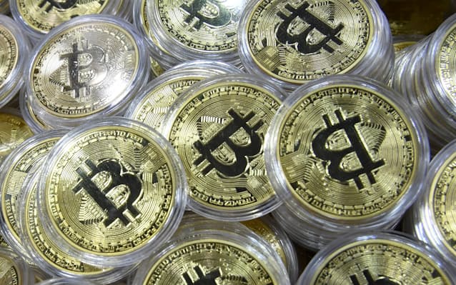 【日本経済新聞】暗号資産（仮想通貨）で運用する上場投資信託（ETF）が2028年に解禁